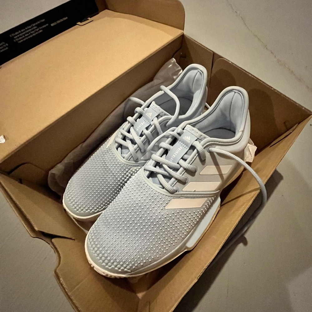 Adidas tennis shoes 8.5 never worn new with box